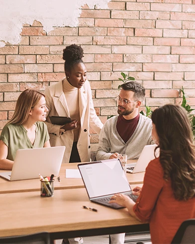 young-multiethnic-startup-team-working-rustic-office- - Concierge Health Advocacy Benefit - diamond care